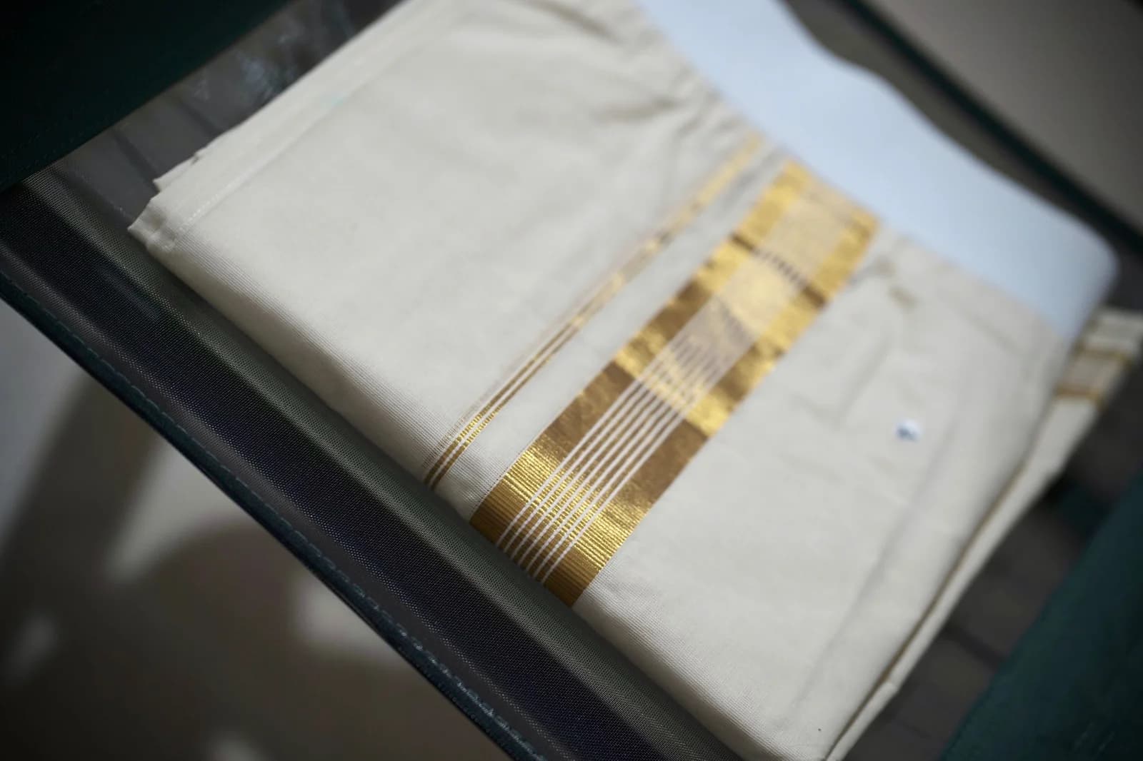 PREMIUM KASAVU MUND WITH POCKET – GOLDEN WEAVE